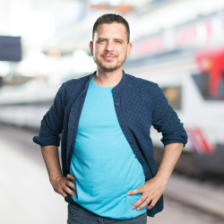 young-man-wearing-blue-outfit-looking-confident